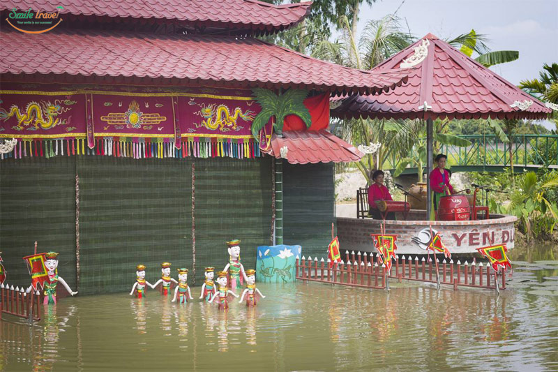 Water puppet show in Yen Duc Village-Dragon legend cruise